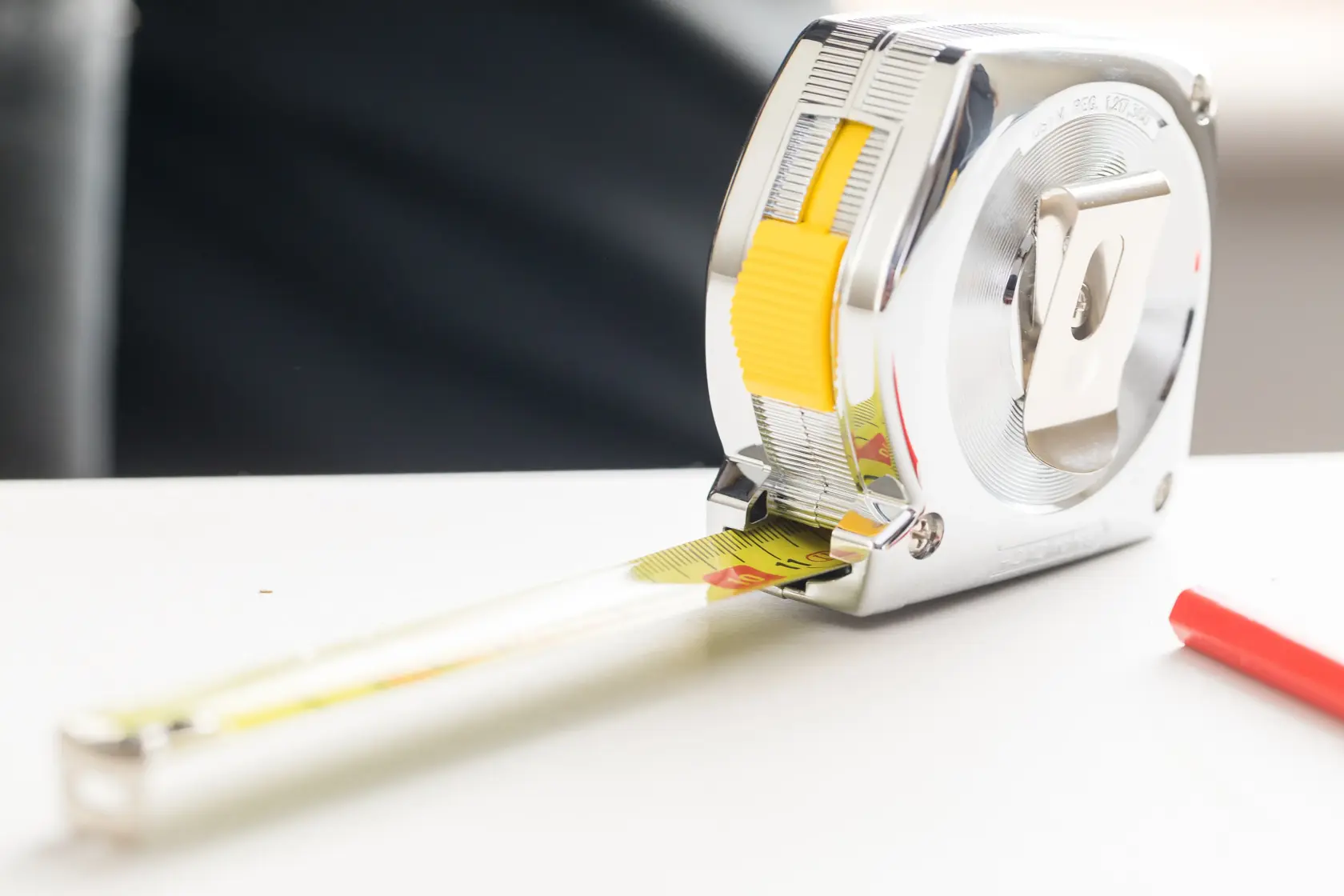 Stanley Powerlock 5m chrome tape measure with yellow and black label.