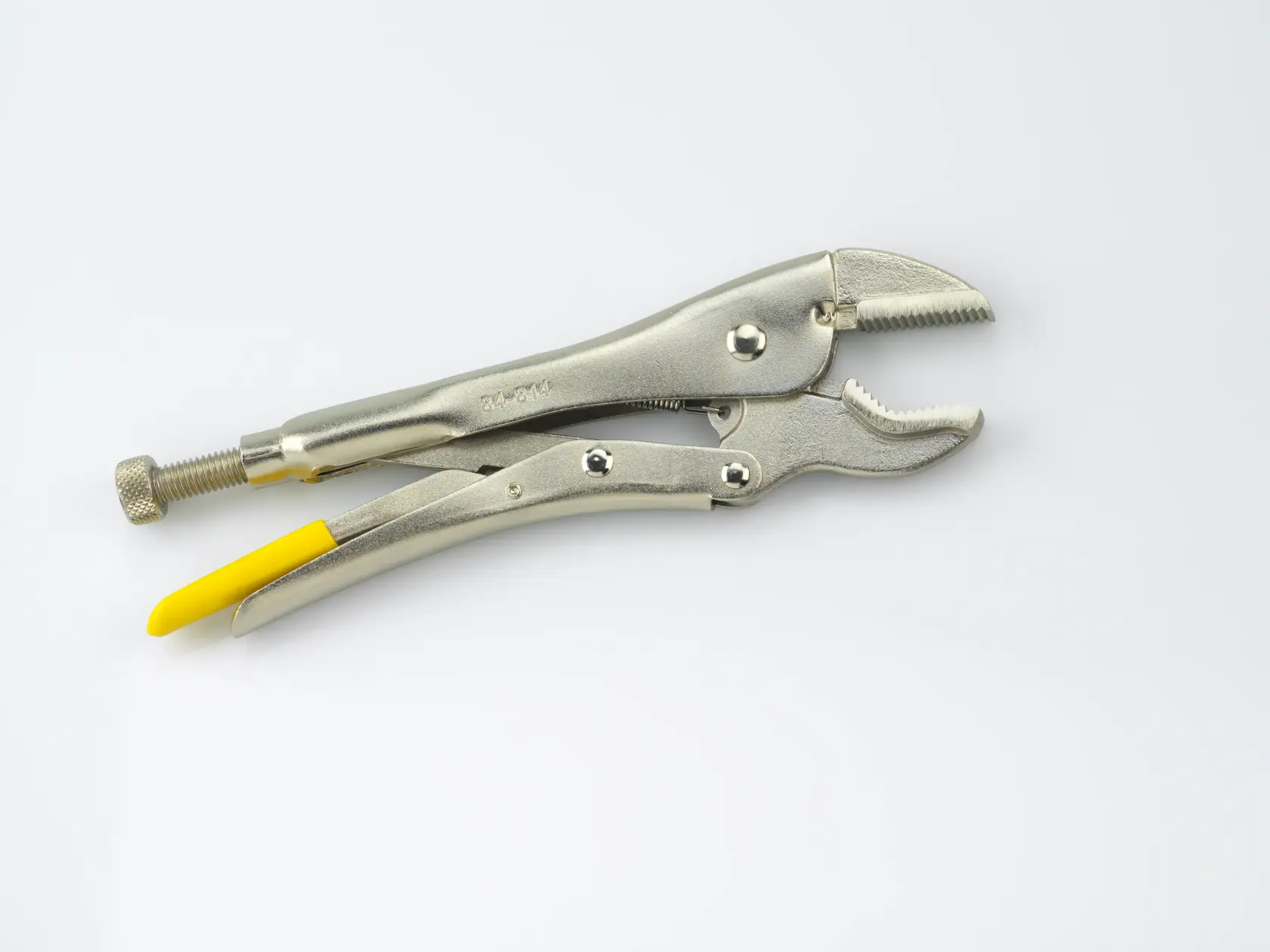 STANLEY 0-84-814 locking pliers with curved jaw and yellow handle, side angle, on white background.