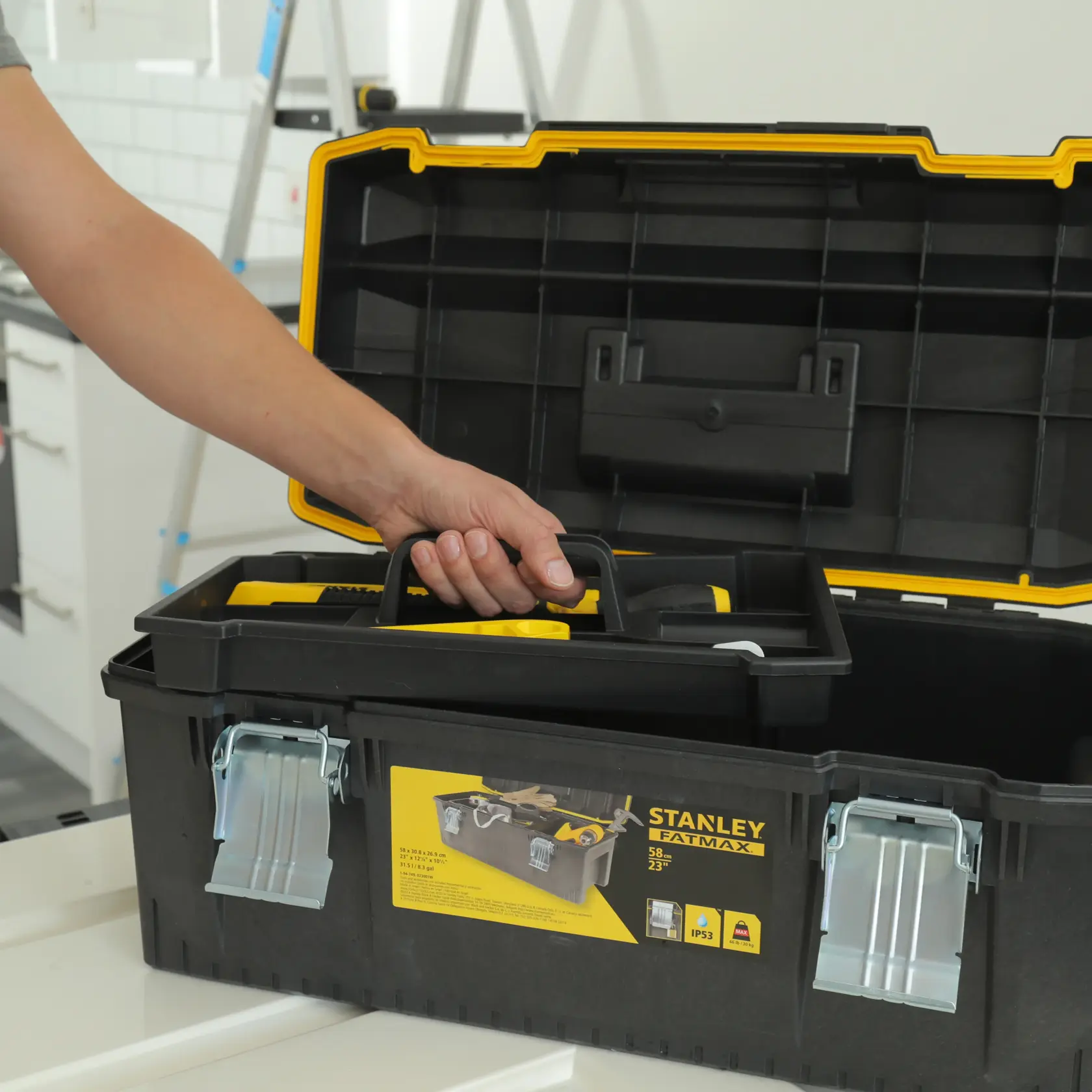 STANLEY 1-94-749 tool box with open lid showing interior tray and metal latches, photo in workshop.