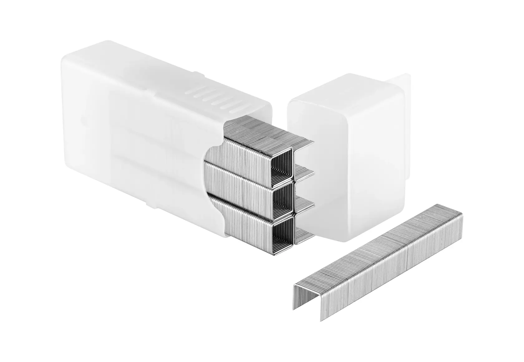 Close-up of metal staples in a white plastic box, some staples are outside the container on a white background.